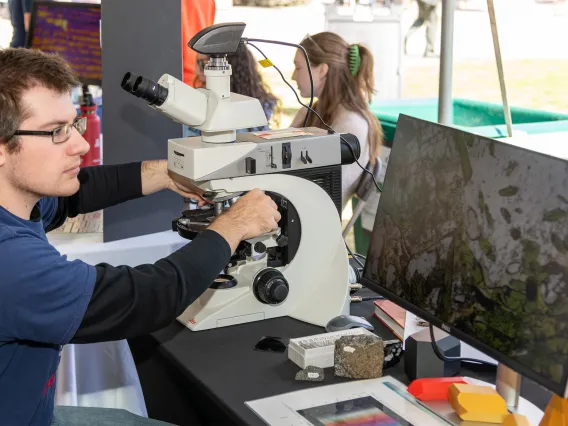 Student with microscope