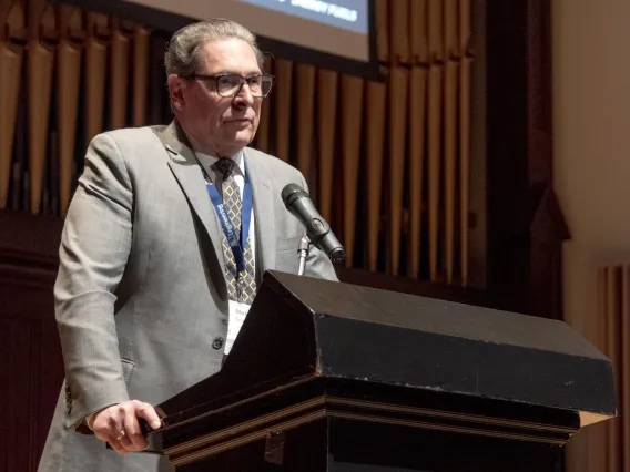 Mark Chalmers speaking at the 2022 Lacy Lecture