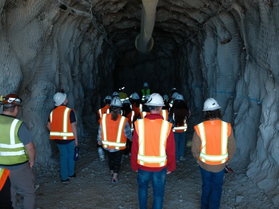 students entering into a mine