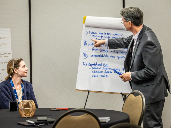 Group activity with board at Mining Social License Summit