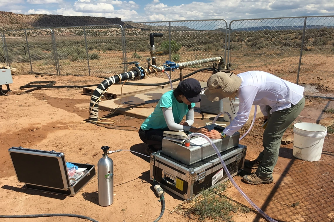 Student sampling at well.