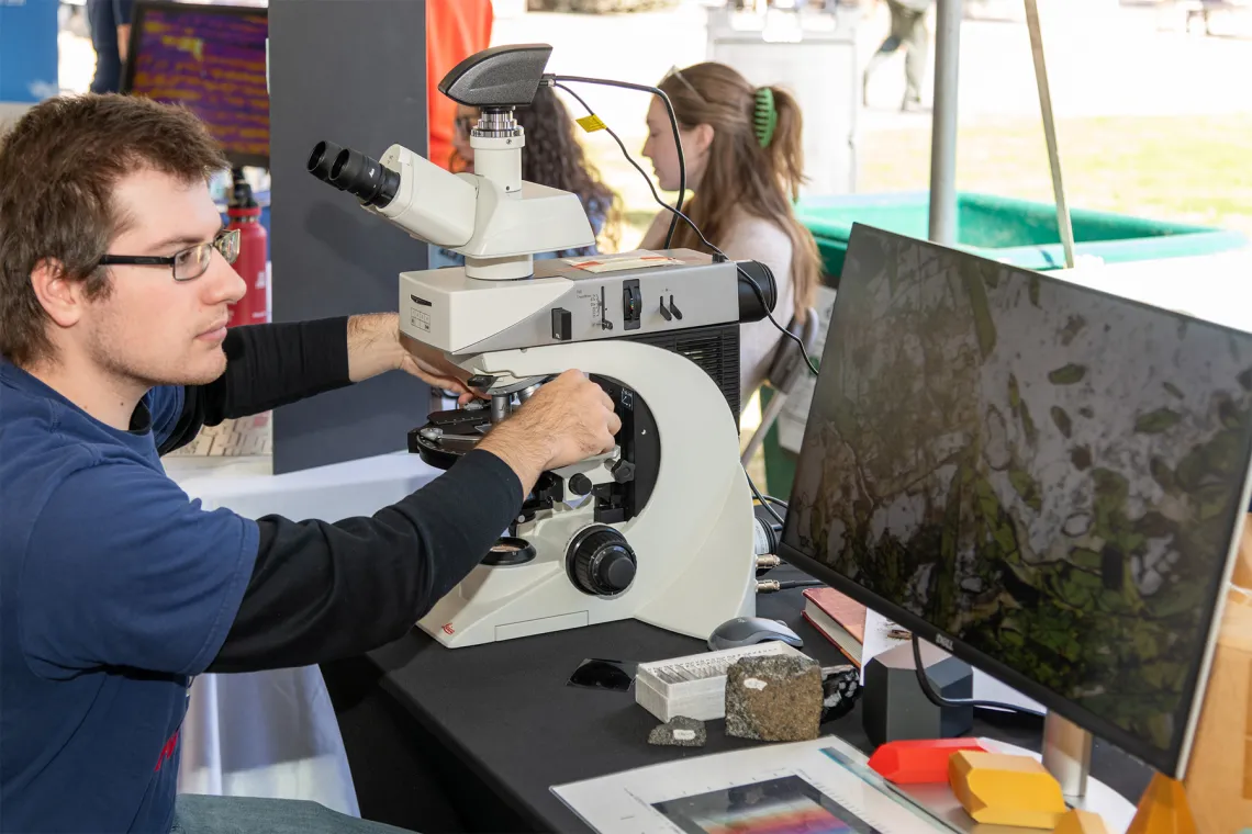 Student with microscope