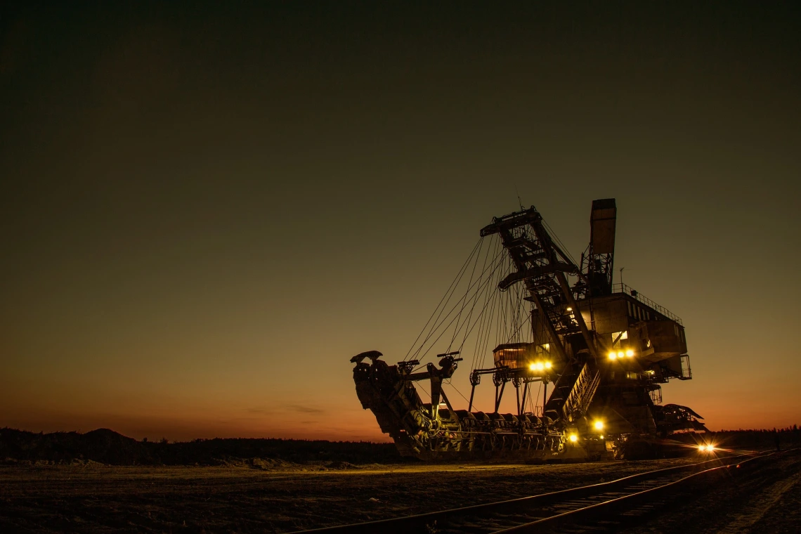 mining excavator with the sunrise