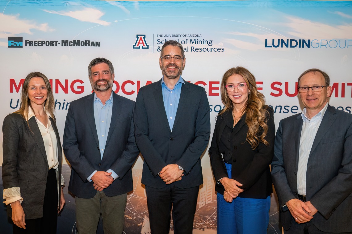 Lindsey Bungartz, Matt King, Nathan Monash, Tracy Bame and David Clarry pictured in front of Mining Summit sign