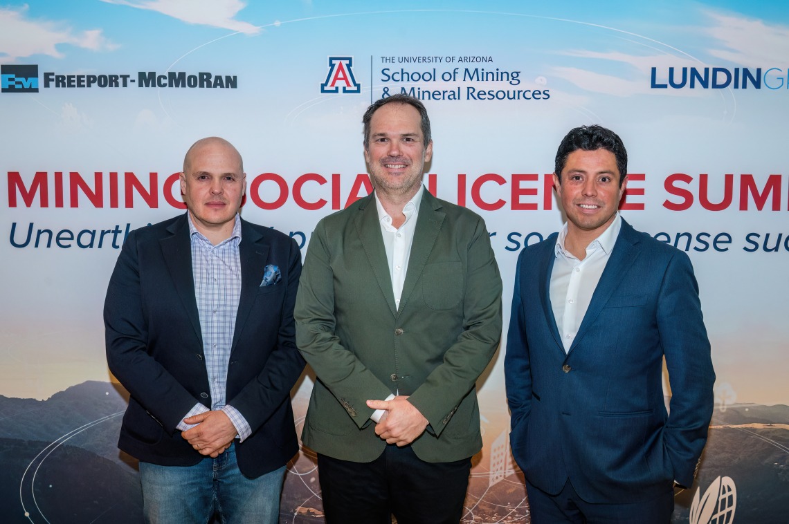 Dario Alvarez, Kieren Moffat, and Hugo Bonilla in front of Mining Social License Summit 