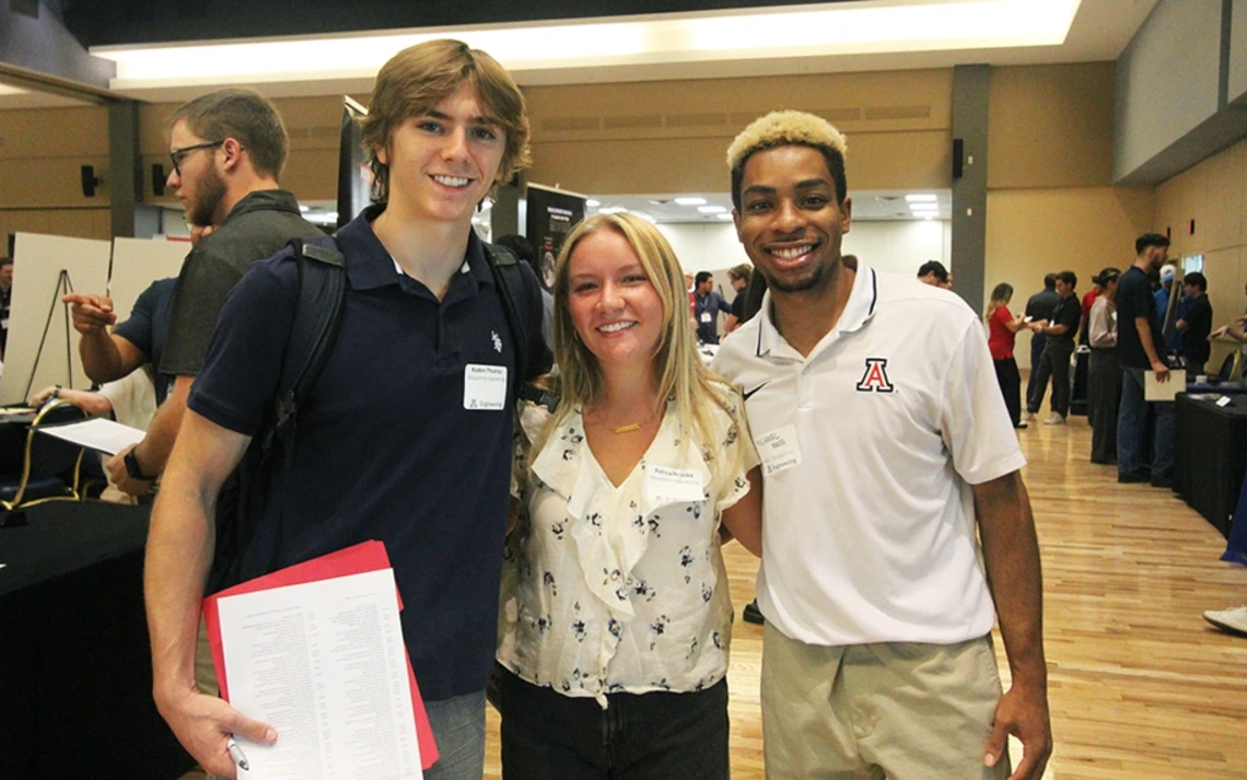 Biosystems engineering seniors Kaden Thomas and Petrea Houska with mining engineering senior Michael Bass