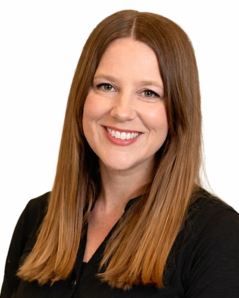 headshot of person with long hair, wearing black shirt
