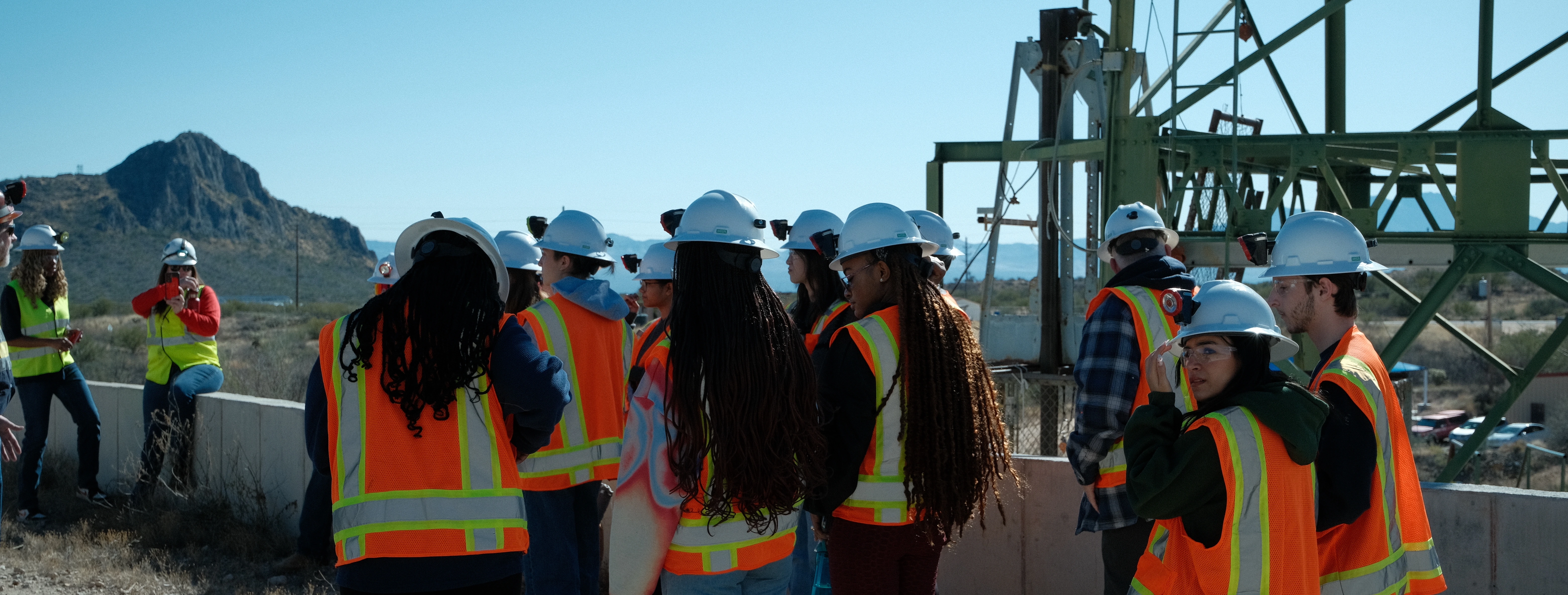 Students with mining gear touring a mine