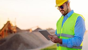 Mining site manager on tablet