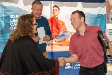 Seth Keinbrook shaking hand with Dean 