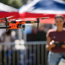 Student flying a drone