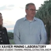 A man and a women are interviewed by a reporter